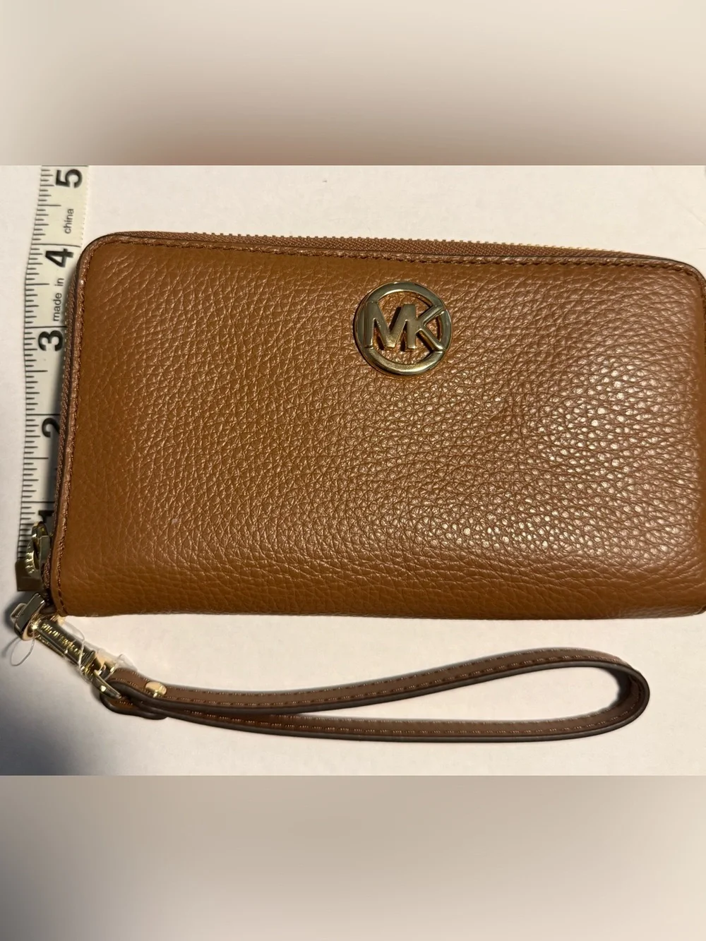 Michael Kors Tan Pebbled Leather Wristlet with Gold Logo